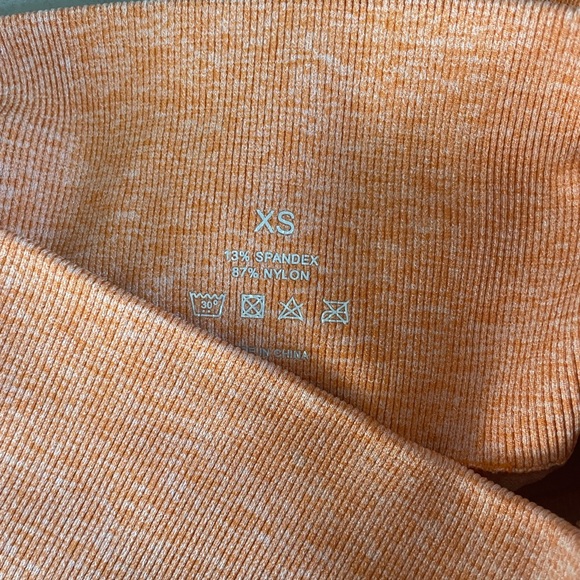 NVGTN burnt orange leopard leggings in size XS - Picture 4 of 4